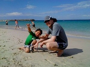 father and son at cottesloe beac