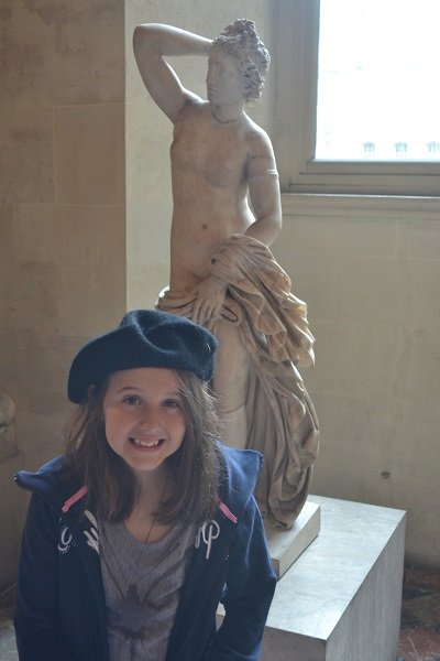 girl in a beret at the Louvre, Paris